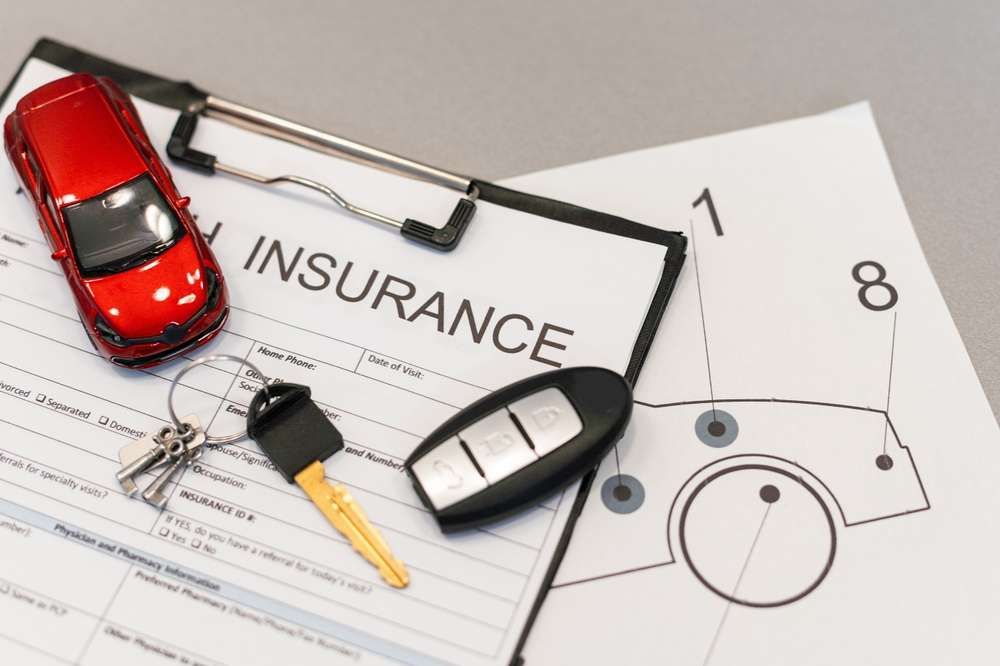 Car insurance, with keys and model car