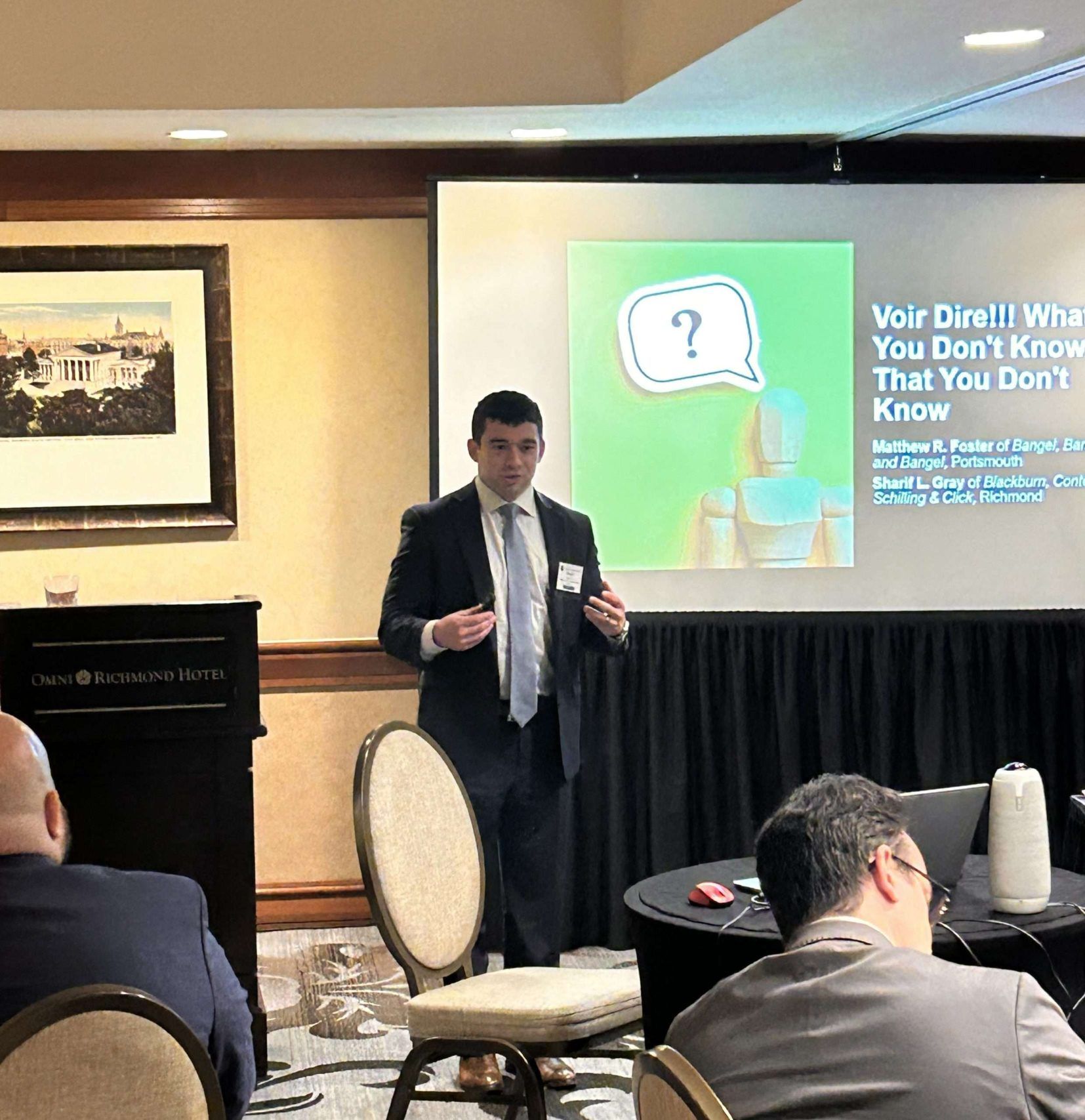 Sharif Gray giving speech in a conference
